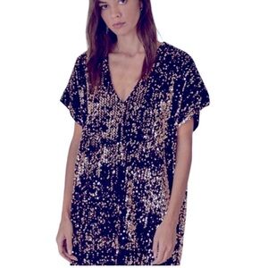 Free people gold sequin, and black sequin oversized top